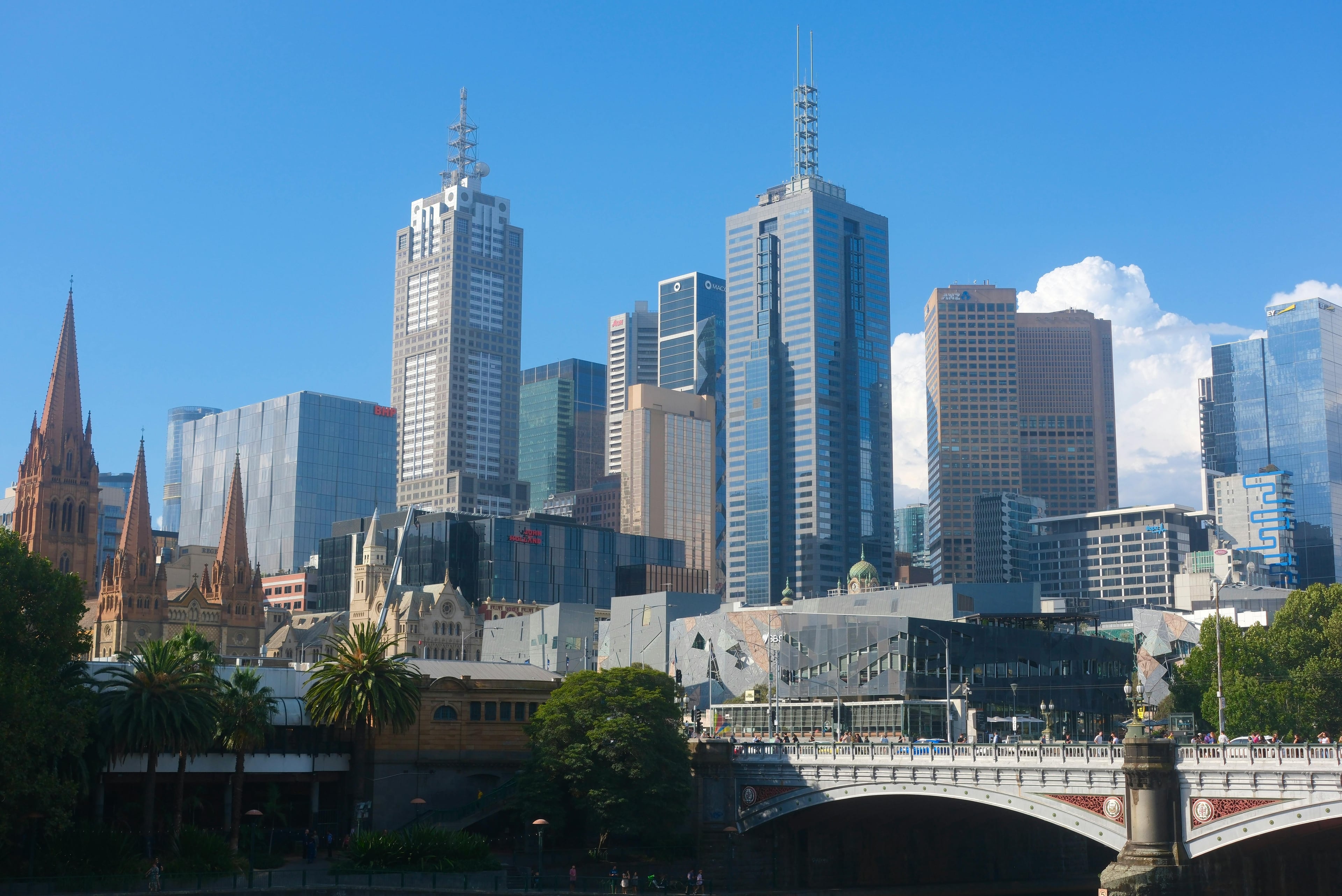 Vibrant view of Melbourne's skyline featuring modern skyscrapers and historical architecture.