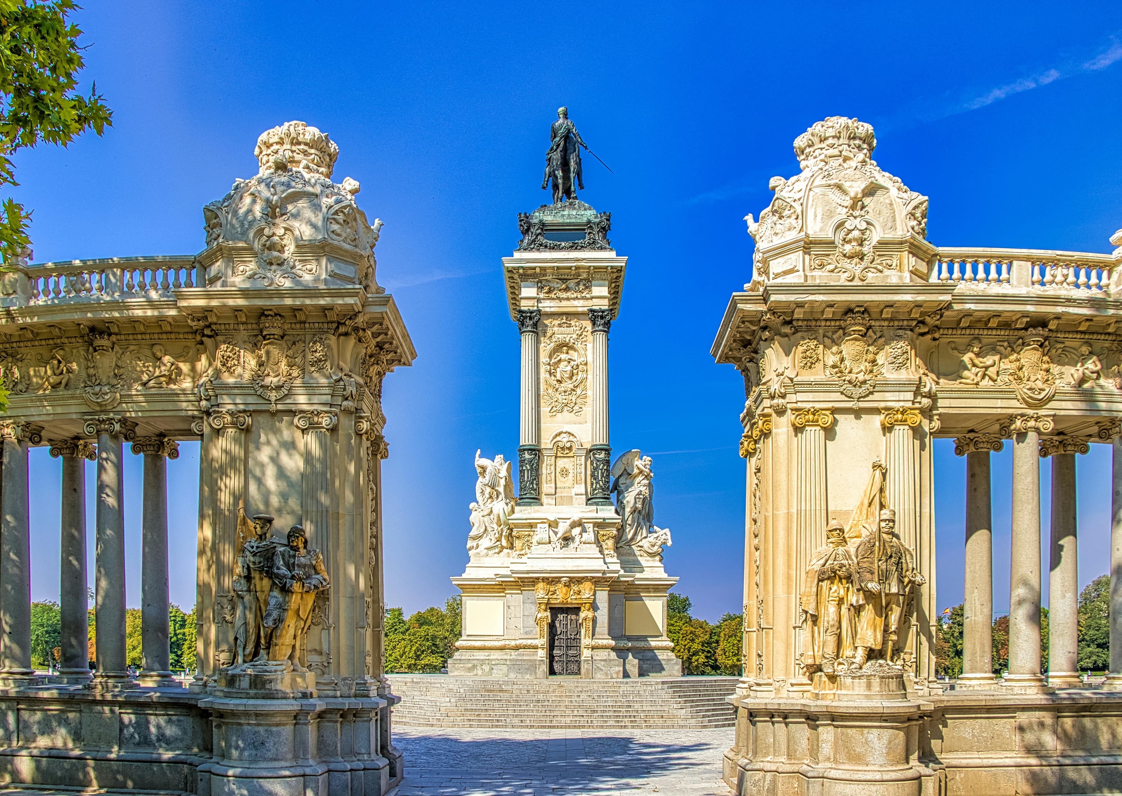 Explore the stunning monument in Retiro Park, Madrid, showcasing intricate Baroque details.